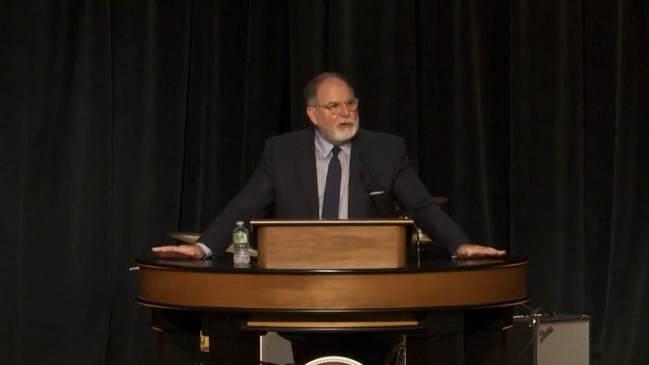 Todd Williams behind chapel podium